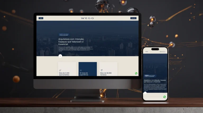 Site da construtora Wegg exibido em monitor e celular